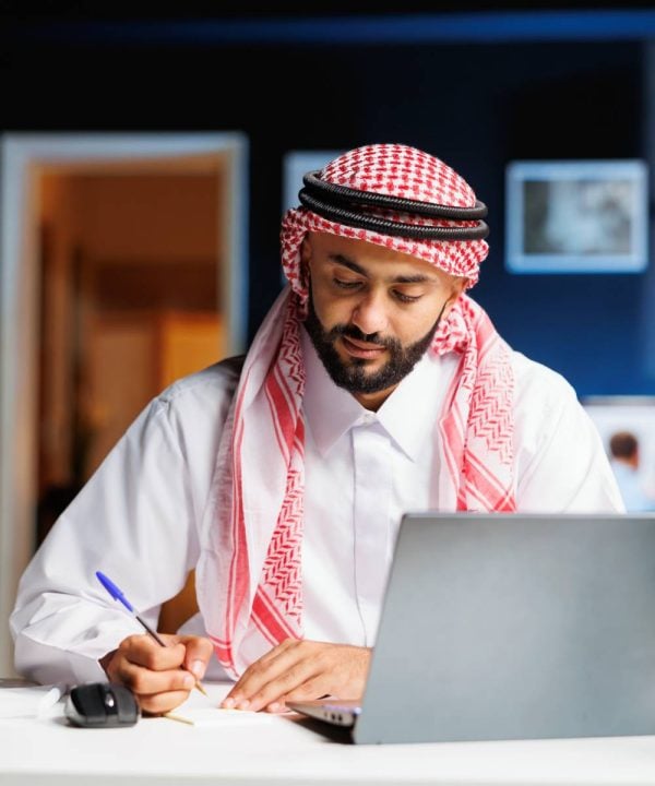 arab-businessman-engrossed-his-work (1) (1)